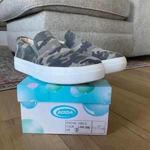 Camouflage slip on sneakers.